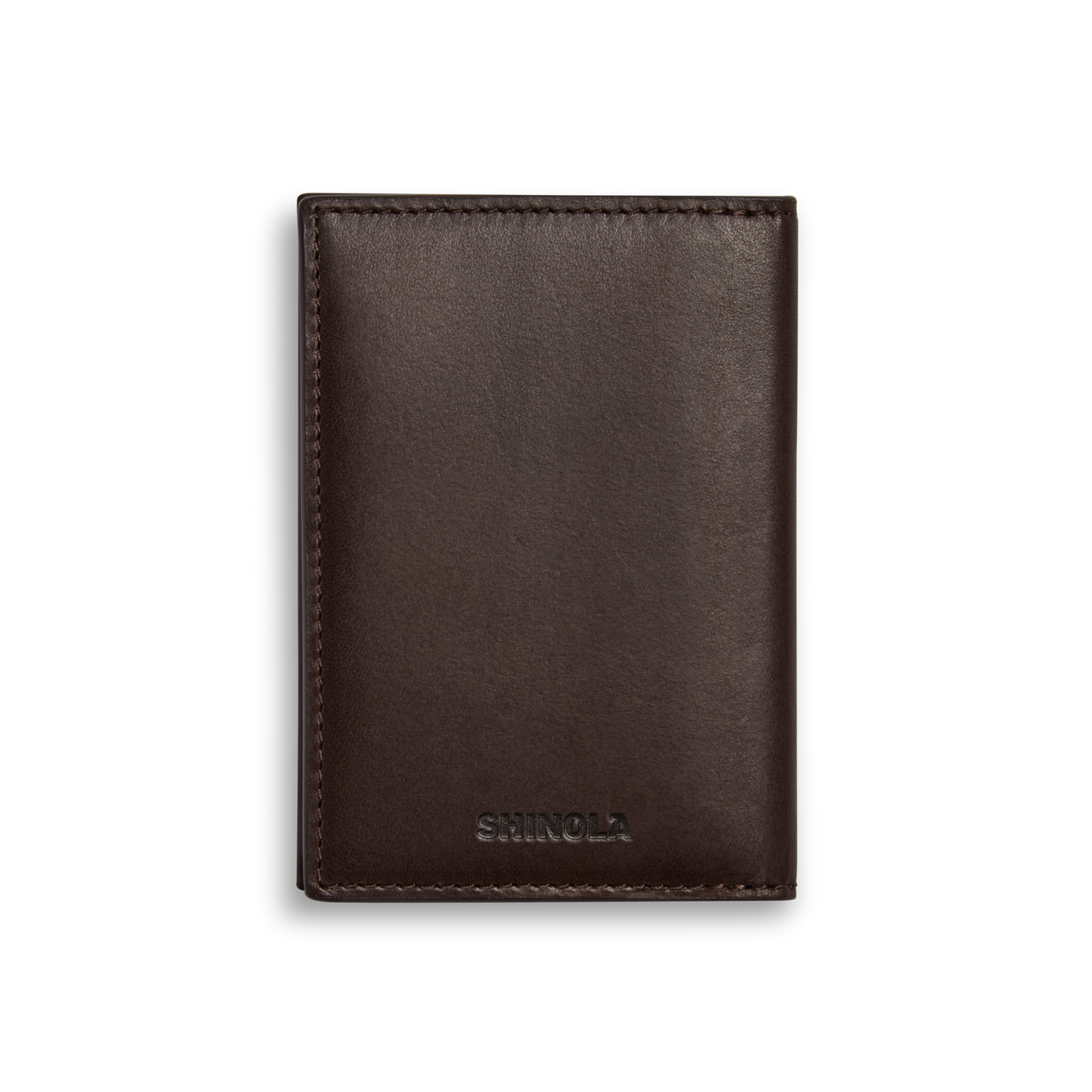 The Folded Card Holder Wallet - Dark Brown by Shinola is a slim, closed wallet made from Italian Vachetta leather with visible stitching and SHINOLA embossed near the bottom center, shown against a plain white background.