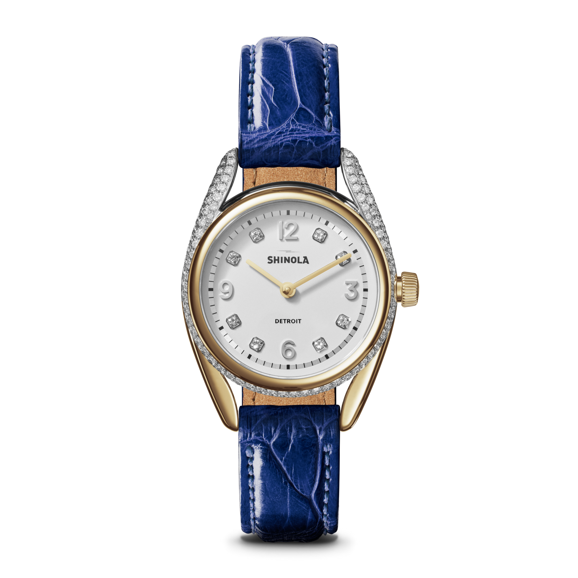 The Shinola Diamond Derby Watch features a sapphire alligator strap, diamond index dial, gold-tone hands, crystal-accented bezel, and the Shinola logo below 12 o’clock.