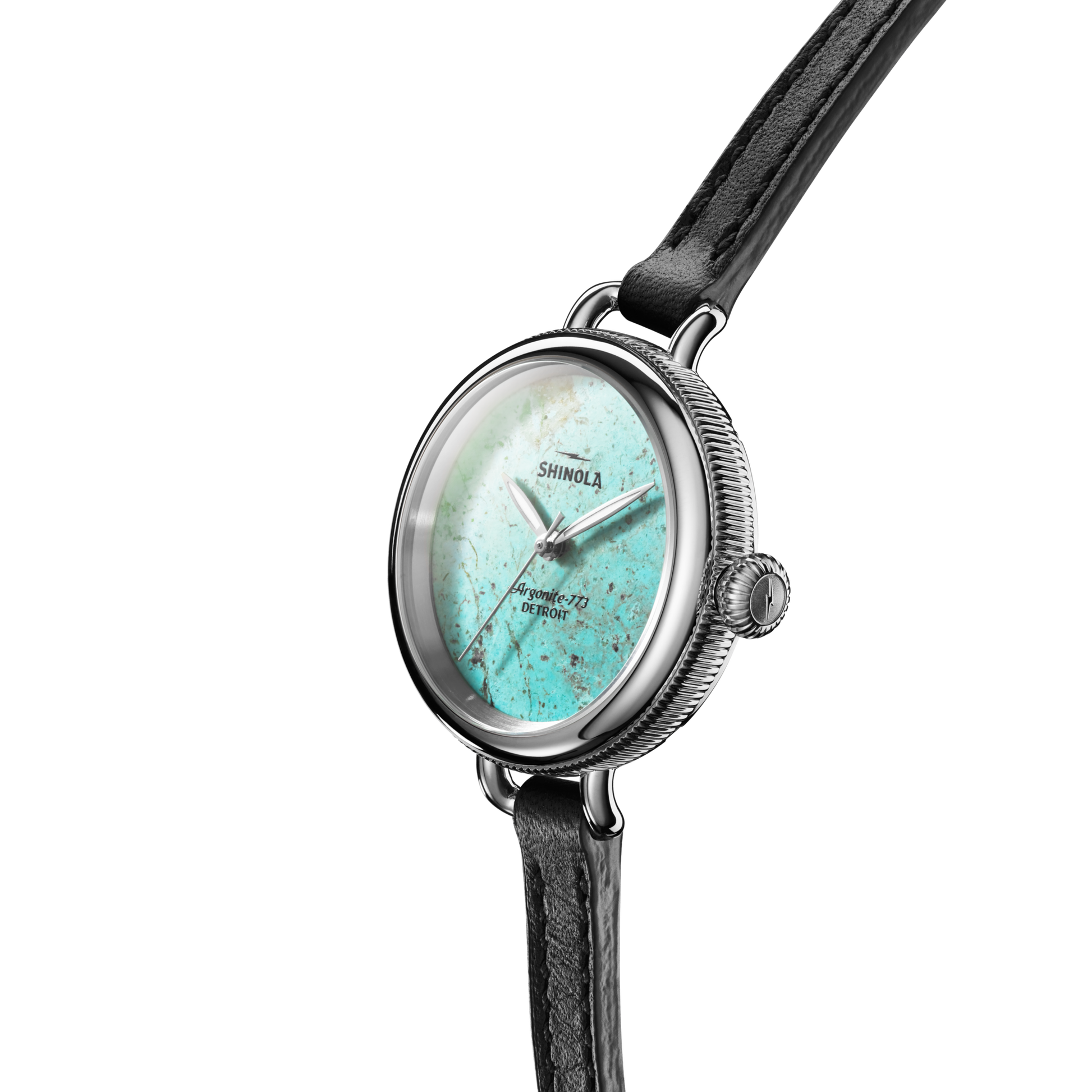 The Shinola Birdy Watch - Chrysocolla features a round turquoise-speckled stone dial, silver bezel, and black leather strap, displayed at an angle on a plain white background. The Shinola logo is visible on the dial.