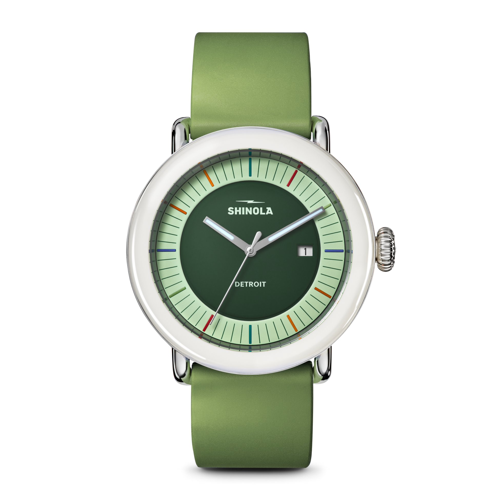 The Shinola Detrola Watch - Deep Olive features a round face, light green dial, white bezel, and green leather strap. This modern wristwatch displays the date and has colorful markers encircling the edge.