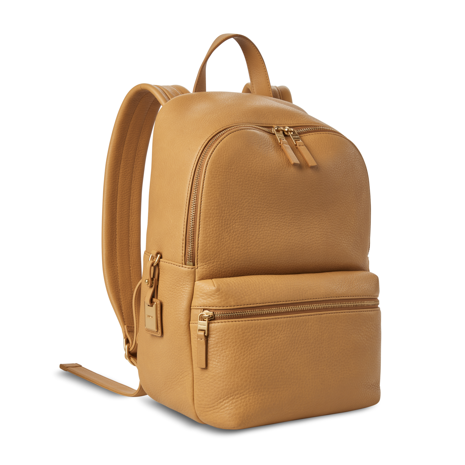 The Shinola Small Runwell Backpack in Honey, crafted from natural grain leather, features a top handle, padded shoulder straps, a spacious main compartment, and a front zip pocket—ideal for daily essentials. Shown against a white background.