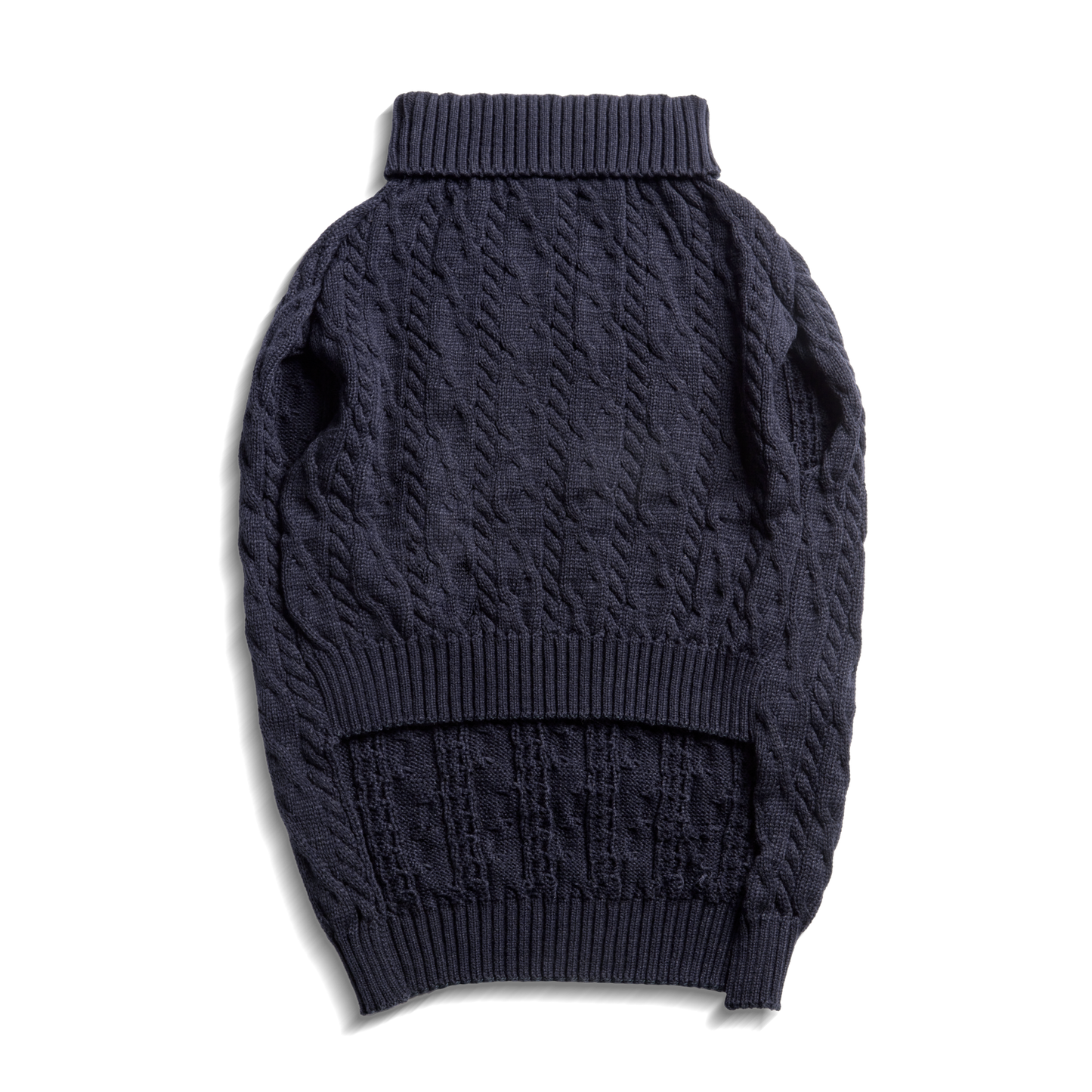 The Shinola Cable Knit Dog Sweater in Navy features ribbed edges and a turtleneck, shown laid flat on a white background.