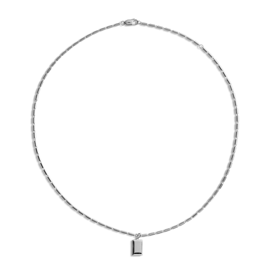 The Shinola Petite Rectangular Tag Necklace features delicate sterling silver rectangular links and a small tag pendant at the center—ideal for personalization as an engravable necklace.