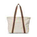The Shinola Large Easy Canvas Tote - Natural is a cream tote with long handles, navy and orange stripes, an exterior slip pocket, and a spacious open compartment, shown against a plain white background.
