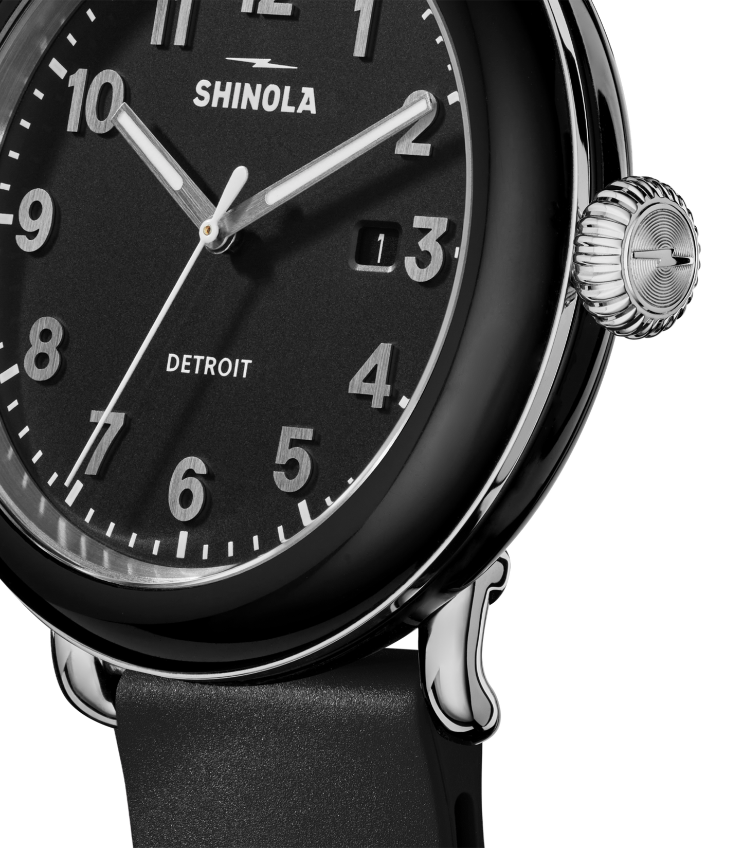 Close-up of the Shinola Detrola Watch - Black, featuring classic American design with a black dial, white numerals, silver hands, date window at “1,” black leather strap, polished metal case, and ridged crown for lasting durability.