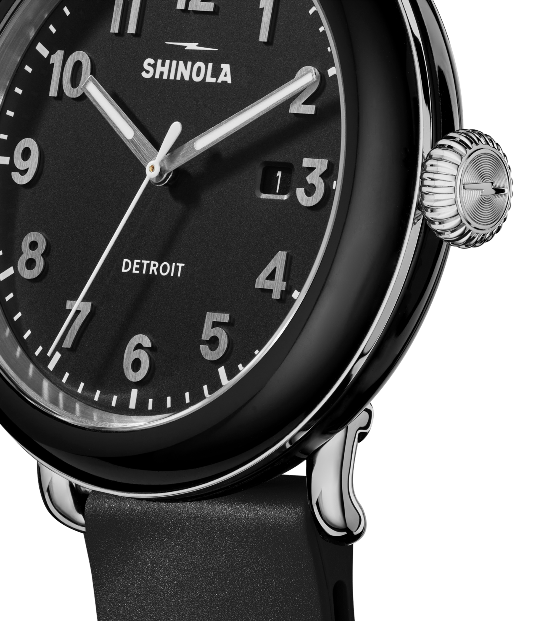 Close-up of the Shinola Detrola Watch - Black, featuring classic American design with a black dial, white numerals, silver hands, date window at “1,” black leather strap, polished metal case, and ridged crown for lasting durability.