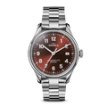The Shinola Vinton Watch - Whiskey features a stainless steel bracelet and a bold red gradient dial with white numerals and hands. The face displays SHINOLA, Argonite-715, and DETROIT.