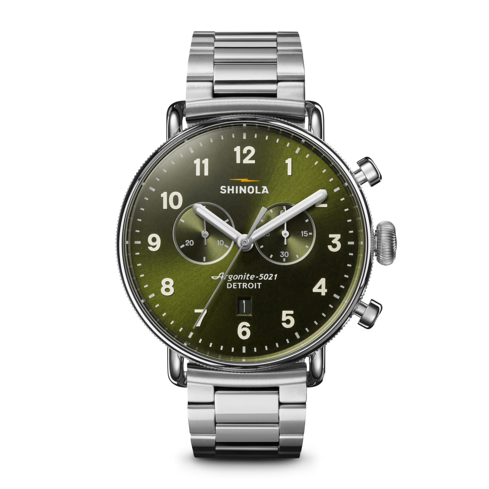The Shinola Canfield Chronograph Watch - Dark Olive features a silver case, dark olive dial with white numerals, three subdials, and a stainless steel link band, shown against a white background.