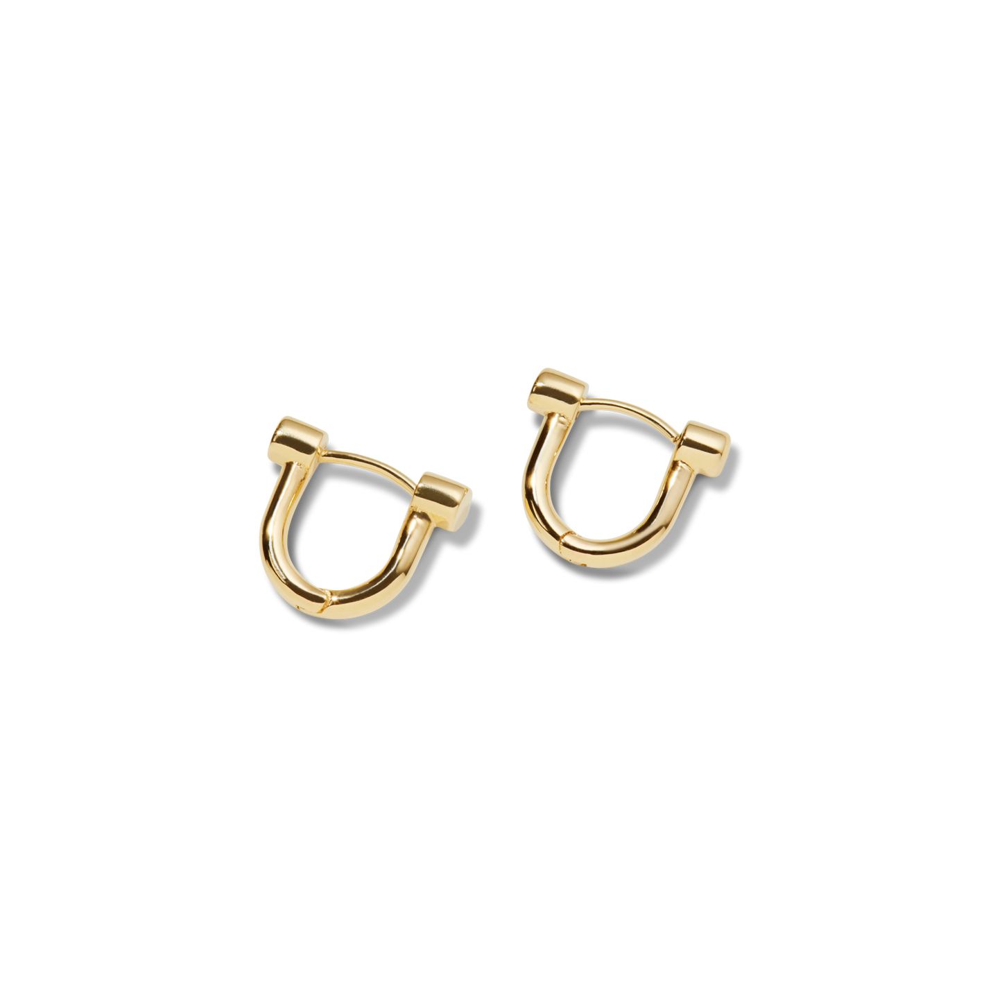 Shinola's Bike Lock Huggie Earrings in yellow gold feature a modern U-shaped design, making them perfect for everyday wear. Shown against a plain white background.