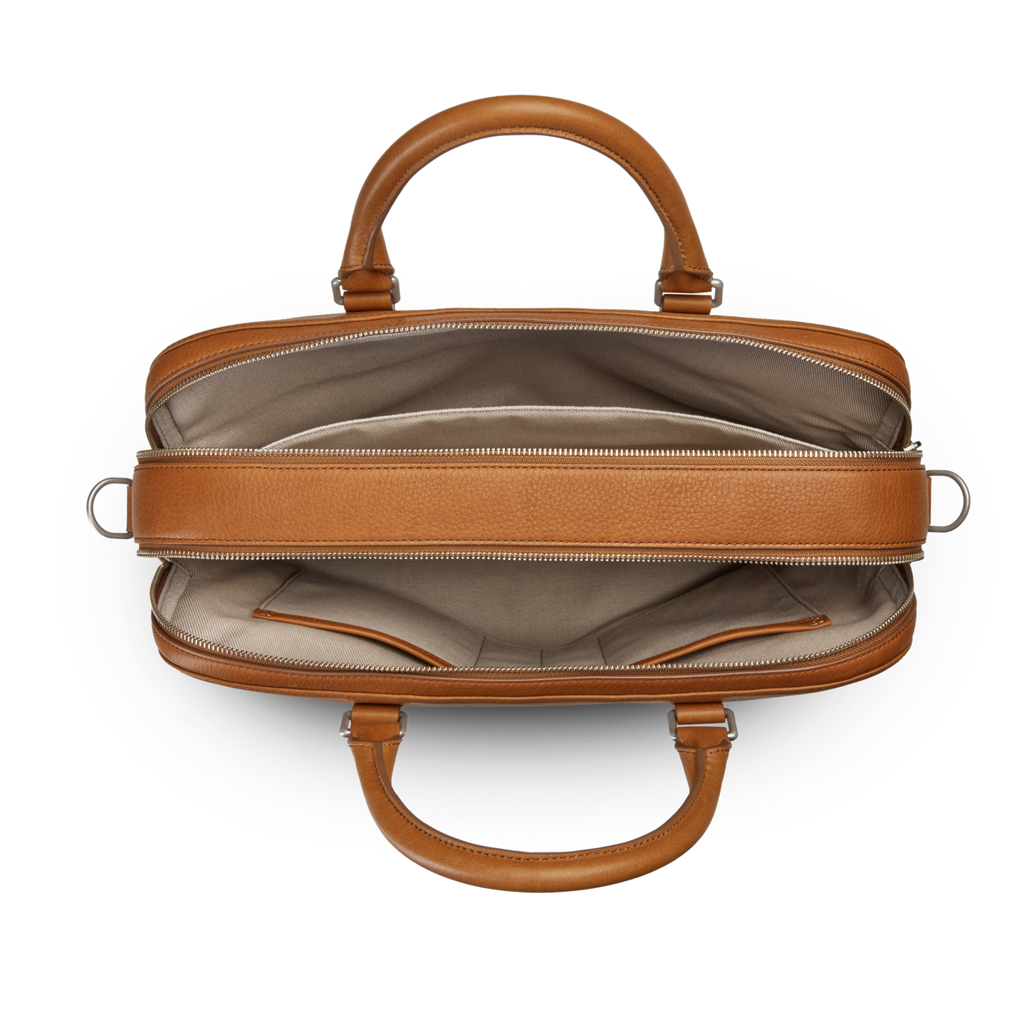 Top view of the Shinola Double Zip Briefcase - Tan in Natural Grain leather, with two handles, beige lining, an extra compartment with pockets, and a central zippered section.