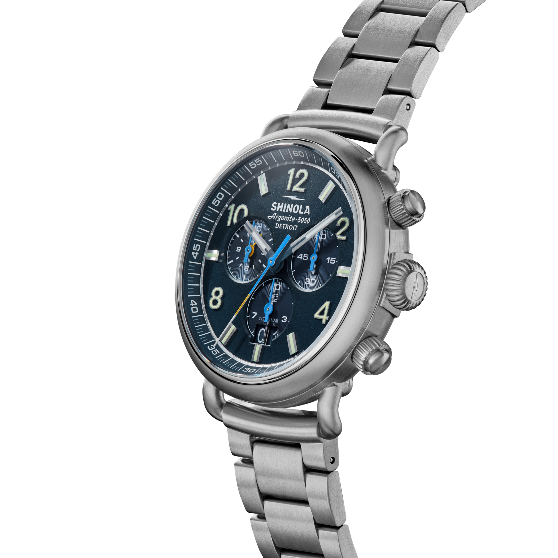 A Shinola Runwell Chronograph West Wind Watch Gift Set with a 42mm blue face, silver markers, luminous dial, three subdials, date window, and extra strap is shown at an angle against a white background.