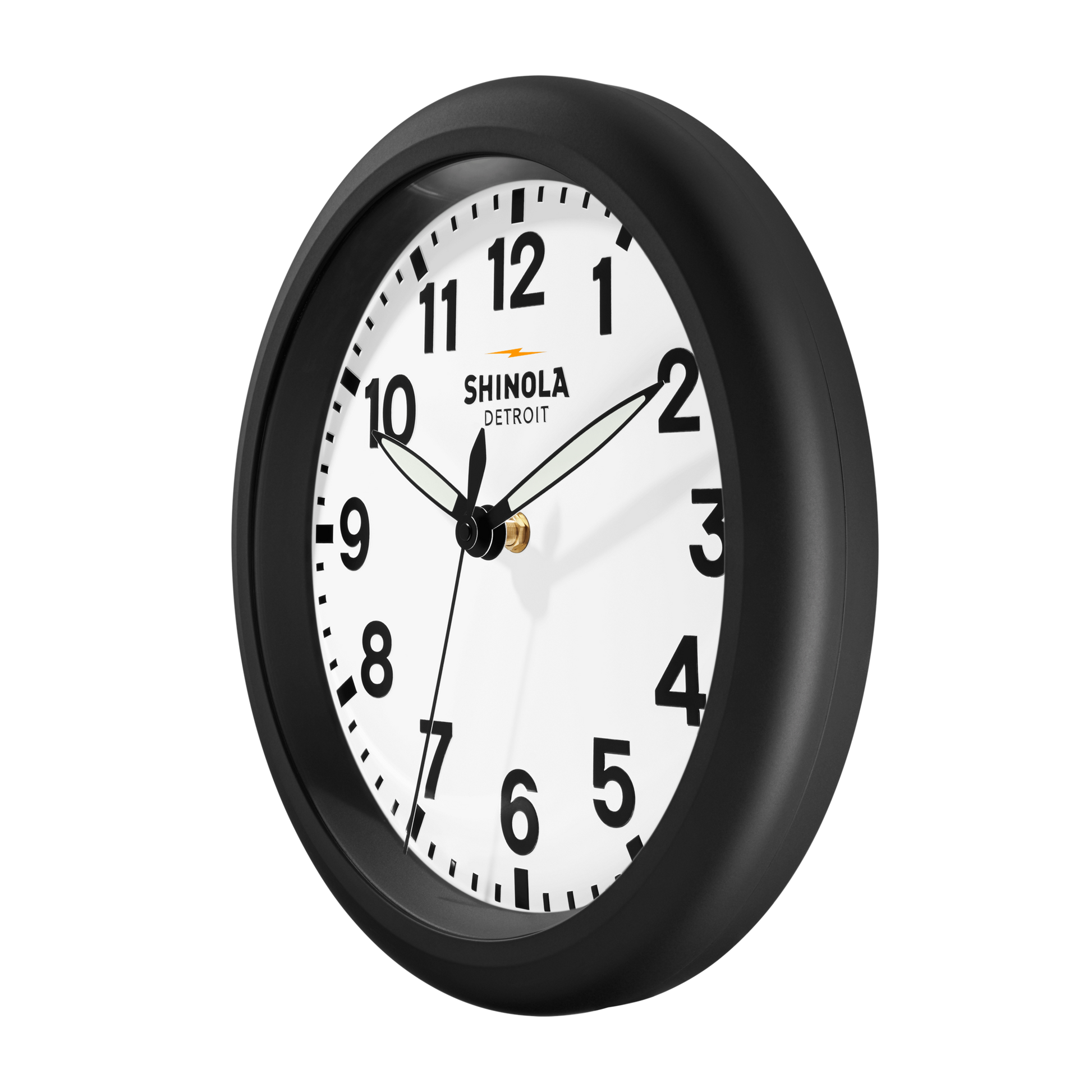 The 14" Runwell Clock - White by Shinola features a black frame, bold numbers, sleek black hands, and “Shinola Detroit” on the face—showing approximately 10:10:10. A timeless addition to any space.