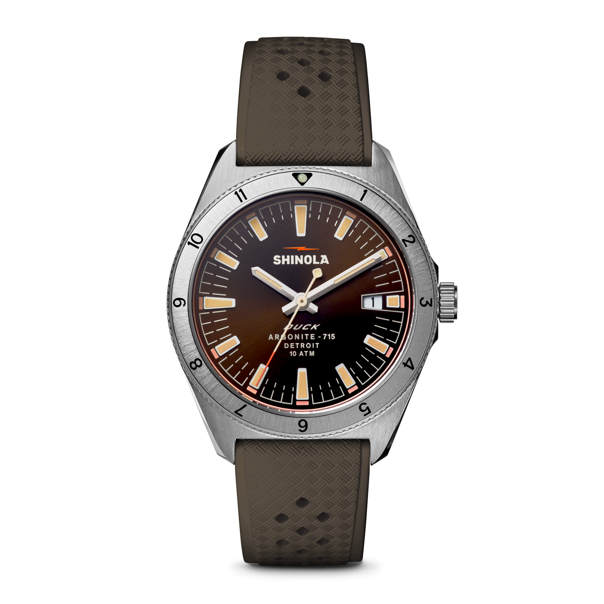 The Shinola Duck Watch - Mallard Brown features a brown gradient dial, silver hour markers, luminous hands, a silver bezel with black numerals, and a textured brown strap with Shinola and Detroit branding.