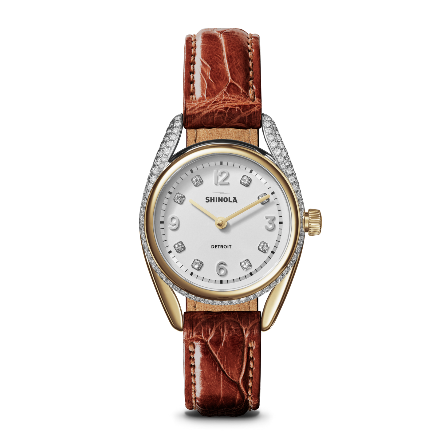 The Shinola Diamond Derby Watch features a two-tone case, auburn alligator strap, diamond hour markers, and a white dial with silver numbers and hands.
