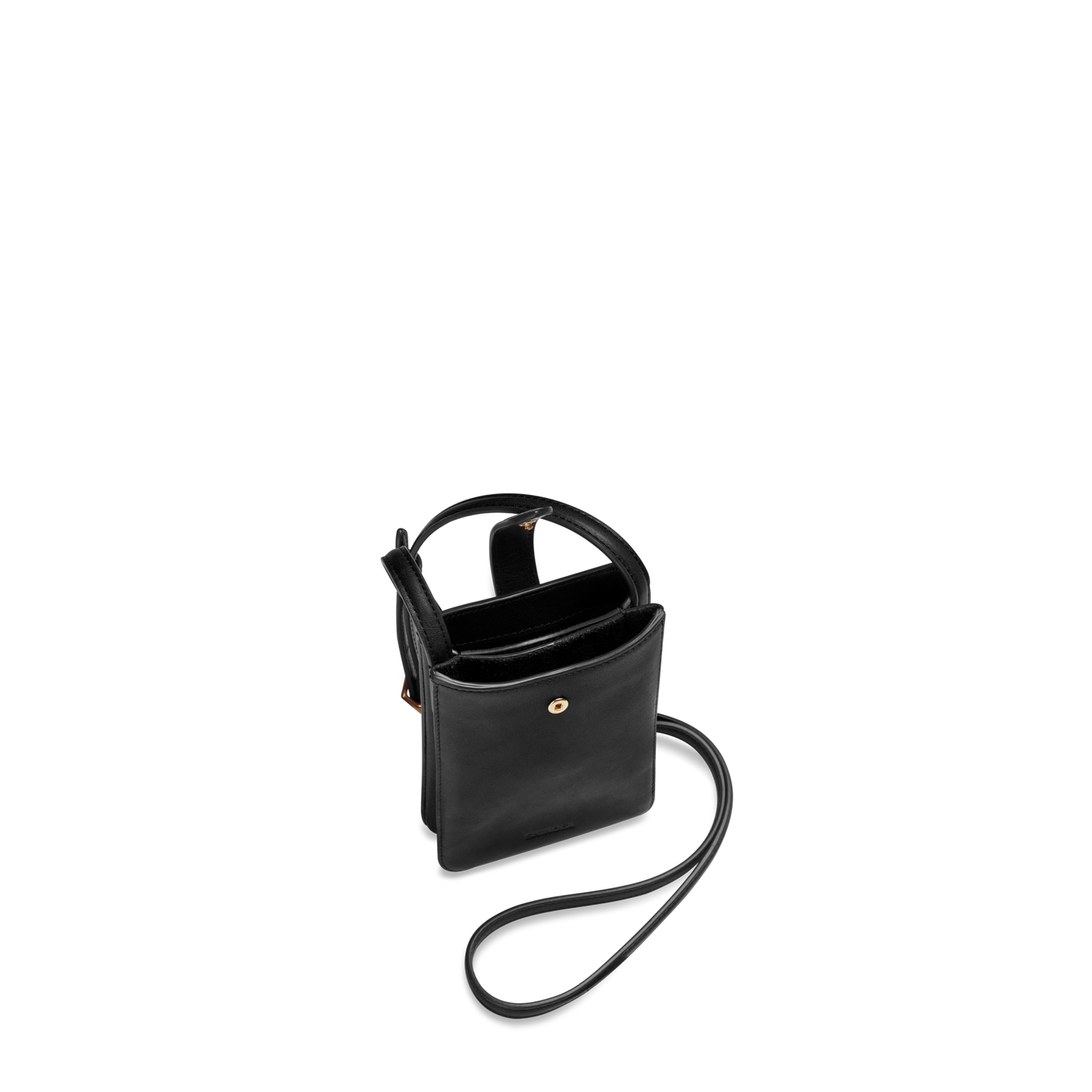 The Shinola Bixby Phone Crossbody - Black is a compact natural leather bag with a long strap, open main compartment, snap-button front pocket, and minimal gold hardware, shown against a plain white background.