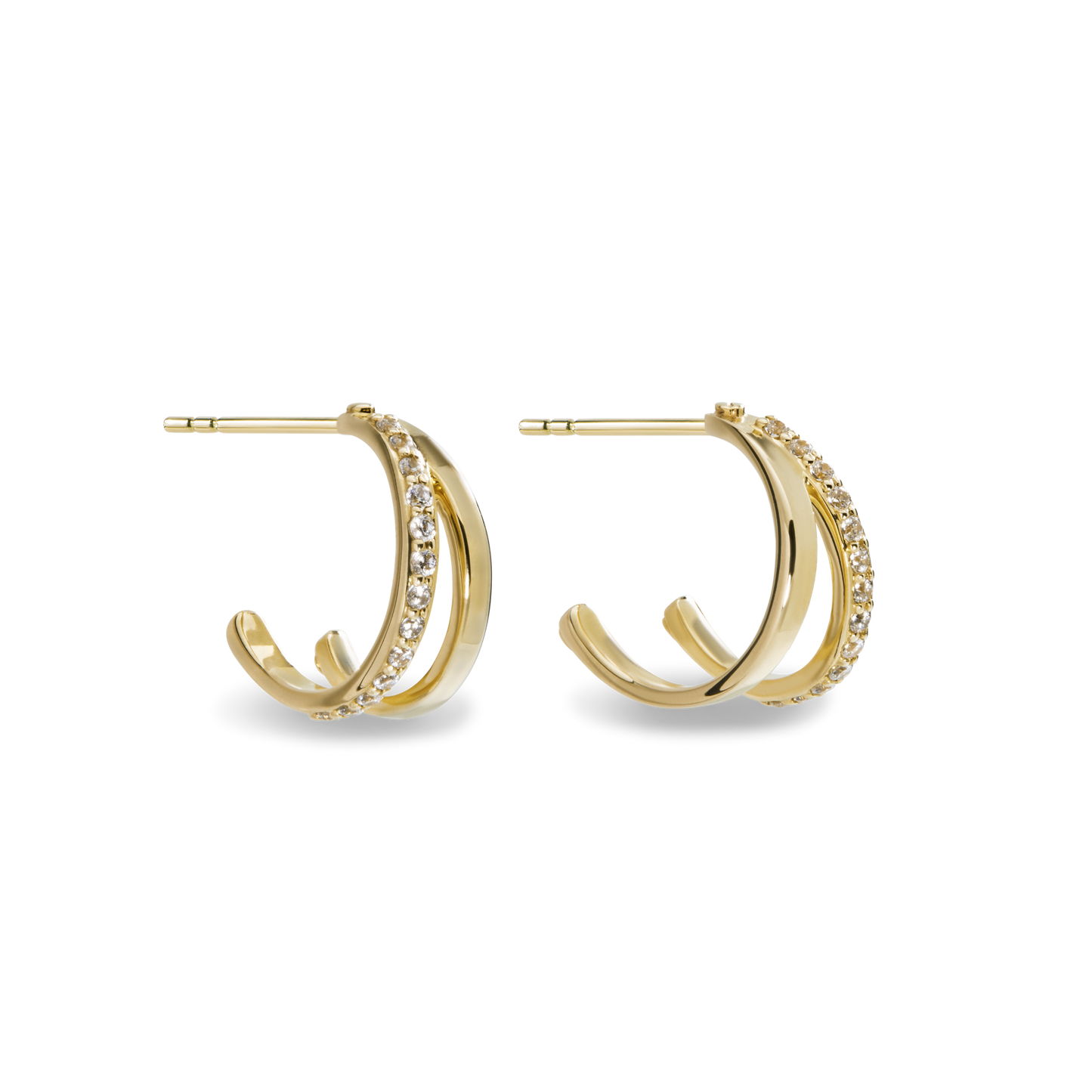 The Shinola Diamond Rivet Huggies are 14k yellow gold hoop earrings with two parallel bands—one plain, one set with brilliant cut diamonds—shown against a white background.