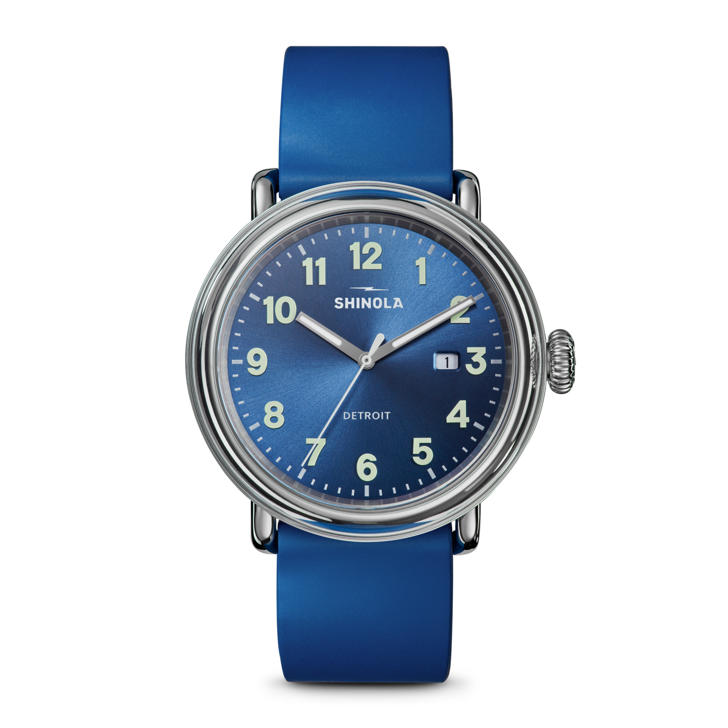 The Shinola Detrola Watch - Denim Blue features a round face with white numerals, silver hands, a date window at 3 o’clock, and a matching blue leather strap. The watch reads 1:11.