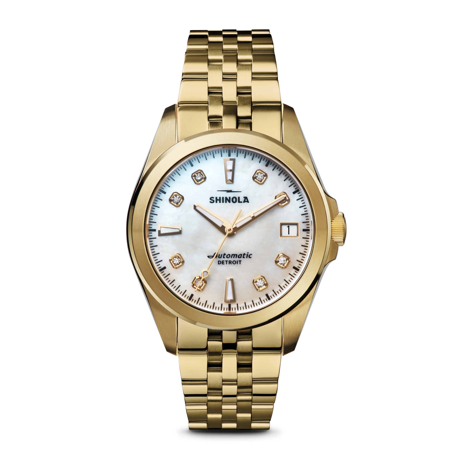 The Shinola Circadian Monster Automatic Watch features a gold case, metal link band, white mother-of-pearl dial with gold markers, and diamond indices, shown against a plain white background.