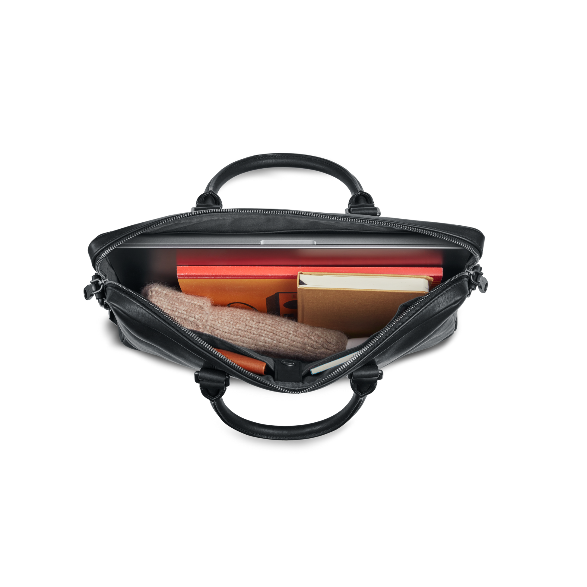 Top-down view of an open shinola.momputer Briefcase - Black holding a laptop, orange notebook, brown sweater, red folder, and beige notebook, all neatly organized inside.