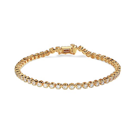 The Shinola 2 Carat 7" Diamond Tennis Bracelet in yellow gold features a single row of brilliant cut diamonds set in prongs with a secure clasp, showcased on a plain white background.