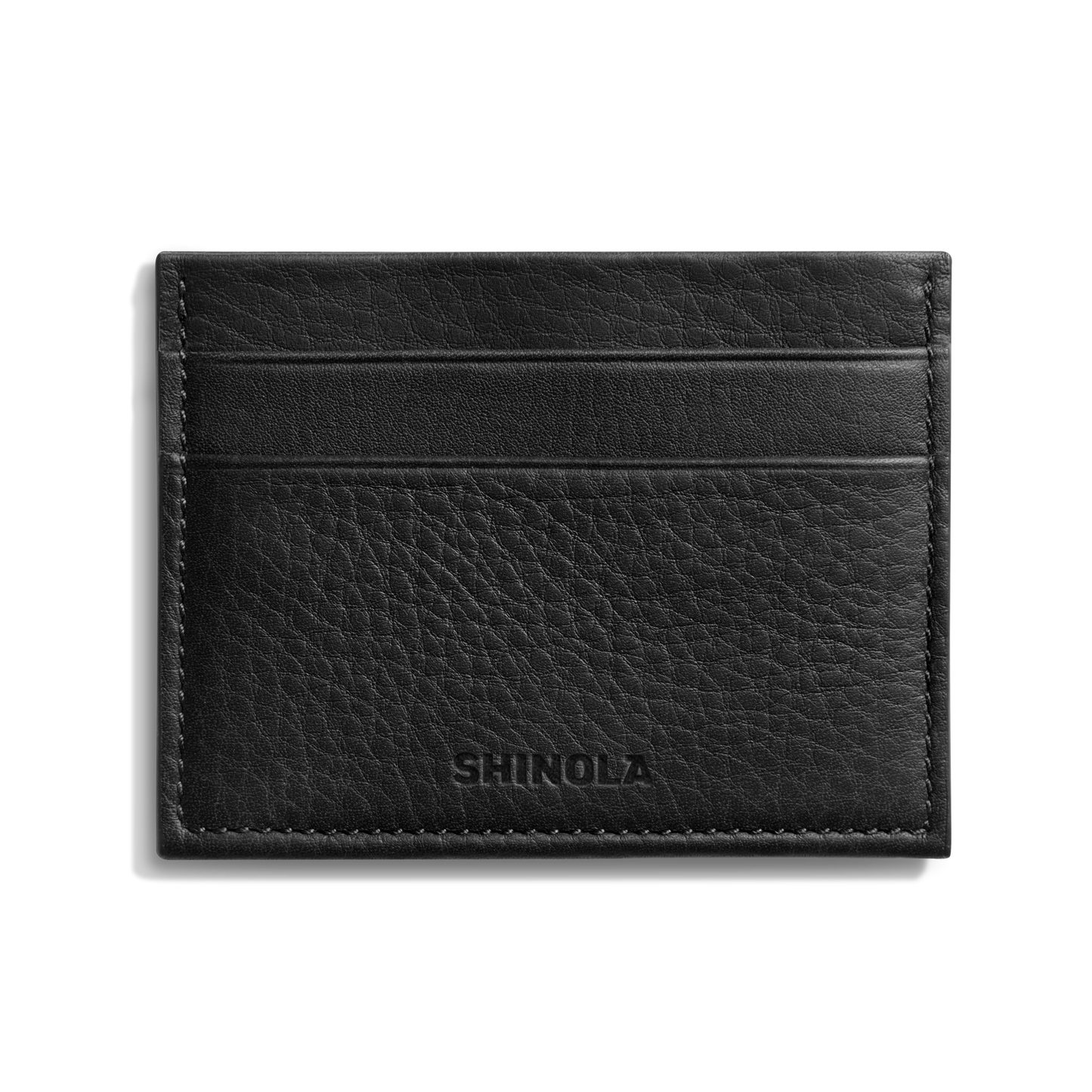 The Shinola 5 Pocket Card Holder in black leather features two horizontal card slots and SHINOLA embossed on the front, combining sleek style and convenience. Displayed against a white background.