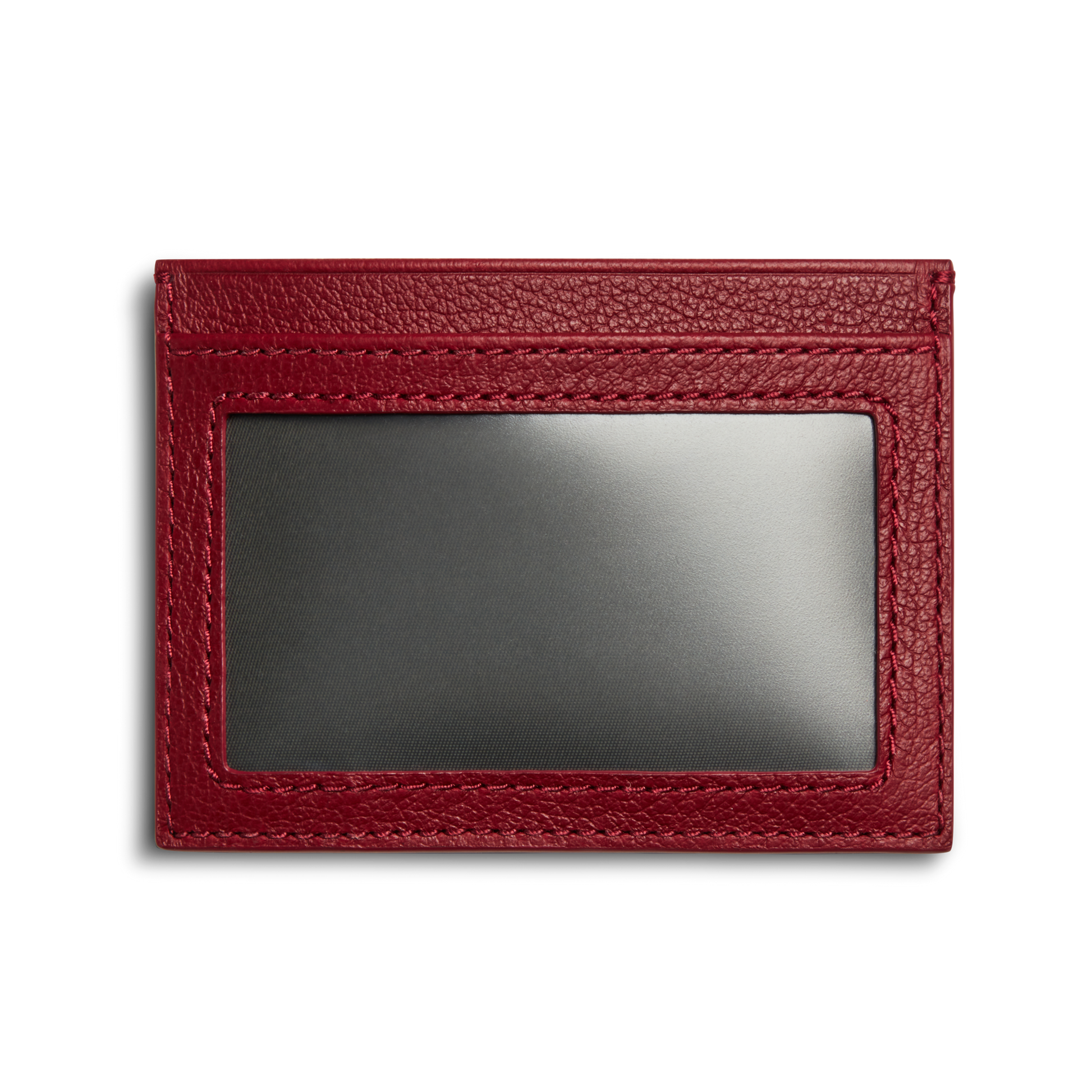 The Shinola Canfield ID Card Holder - Ruby is a red pebbled leather wallet featuring a clear ID window on one side, shown against a plain white background.