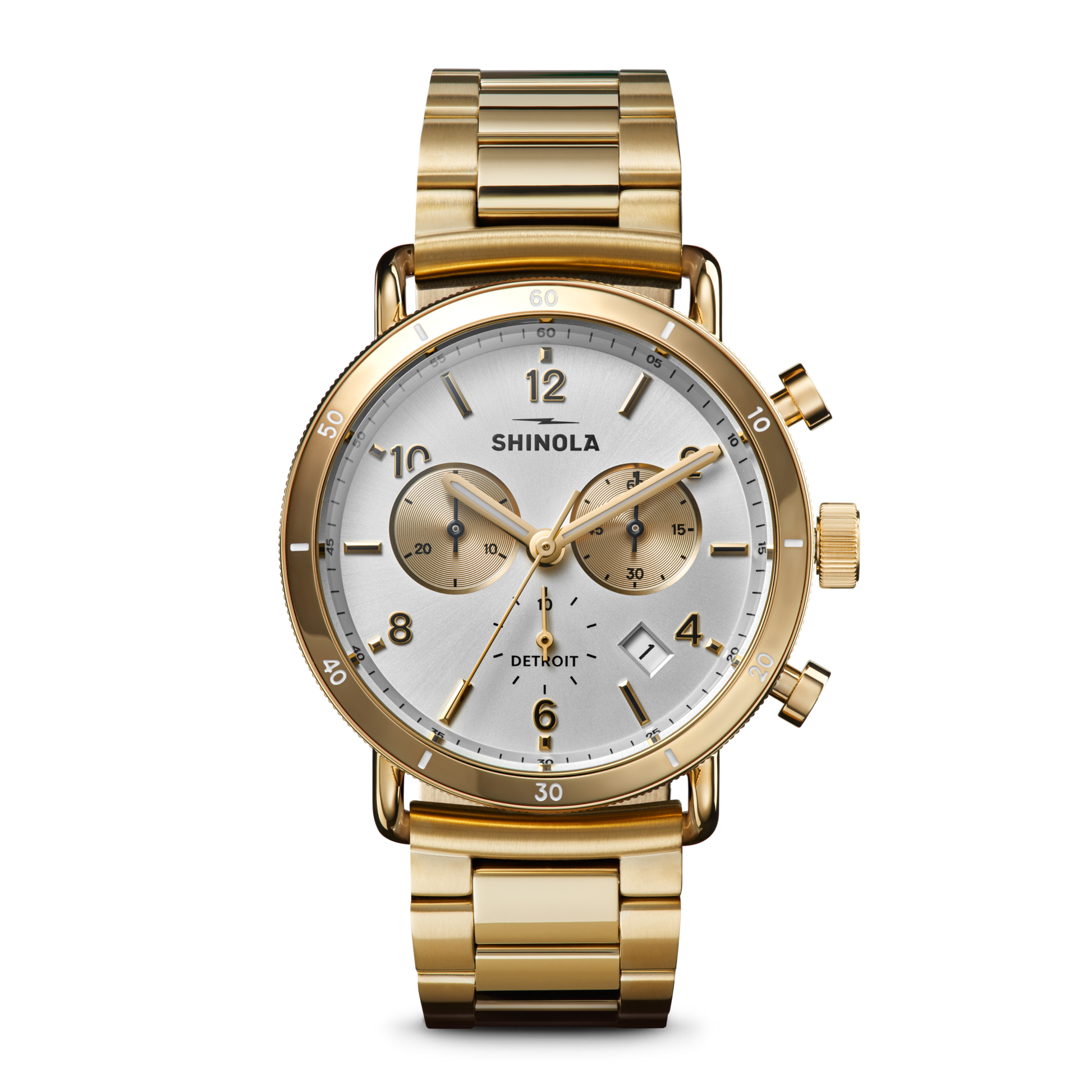 The Shinola Canfield Sport Chronograph Watch - Silver features a gold stainless steel case, silver dial with two subdials, date display, gold hour markers, three side buttons, and a matching gold metal bracelet.