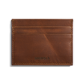 The Shinola 5 Pocket Card Holder in medium brown leather offers RFID protection, two card slots, visible edge stitching, and “SHINOLA” embossed at the bottom center, shown on a plain white background.