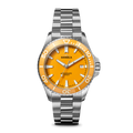 The Shinola Lake Huron Monster Automatic Dive Watch features a stainless steel case, silver metal band, bright orange face, white hour markers and hands, minute indices, and the Shinola name above the center.