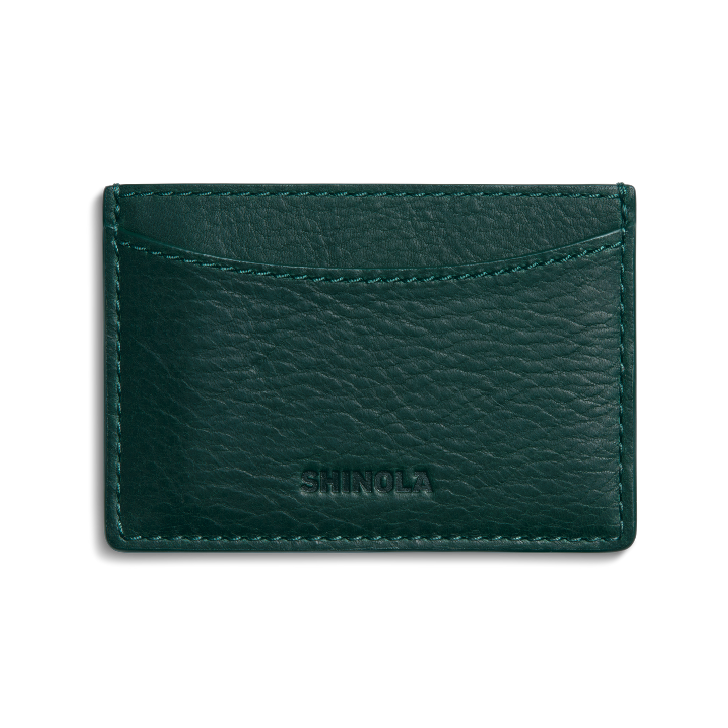The Leather 3 Pocket Card Case - Forest by Shinola features dark green leather, visible stitching, and the Shinola name embossed on the front, shown against a plain white background.