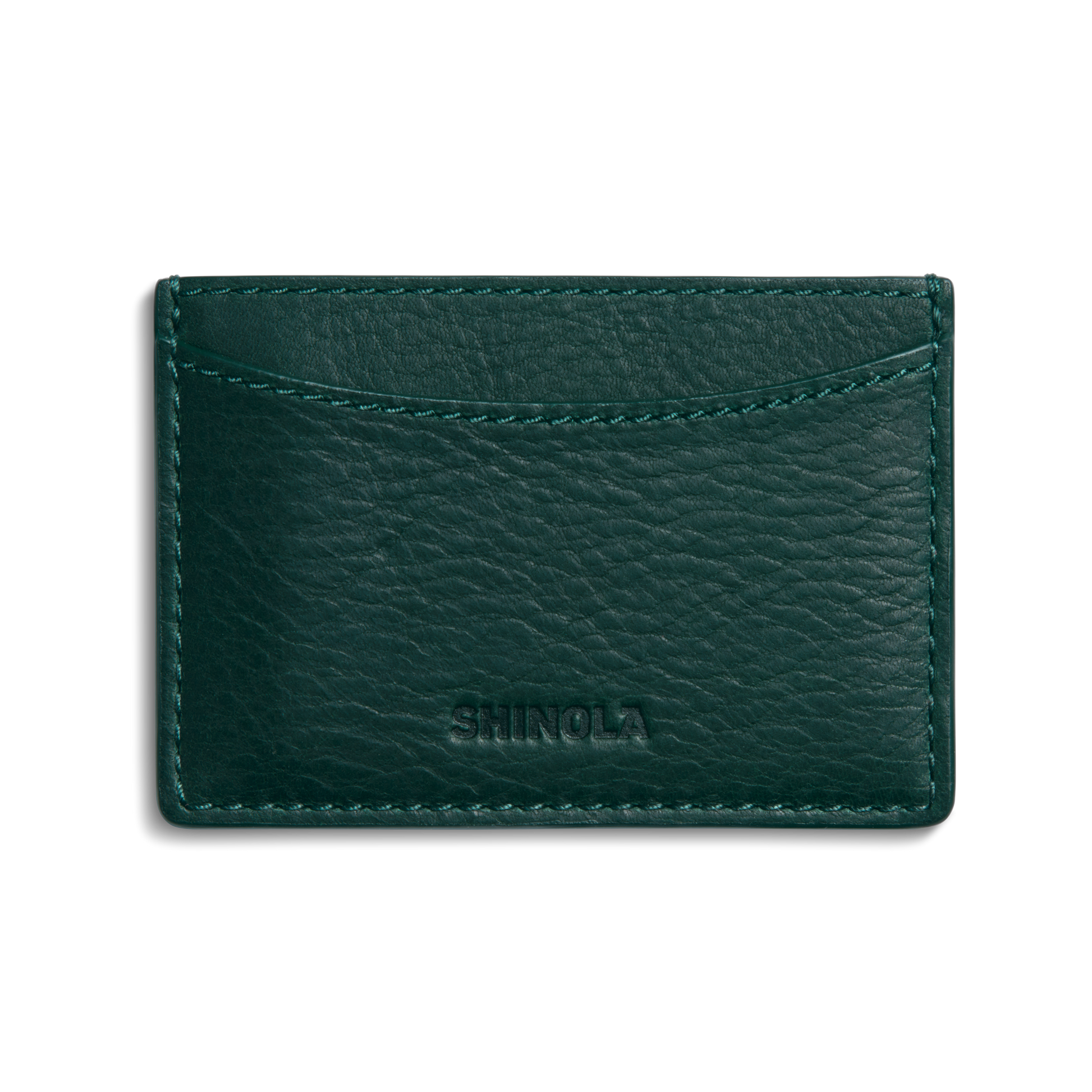 The Leather 3 Pocket Card Case - Forest by Shinola features dark green leather, visible stitching, and the Shinola name embossed on the front, shown against a plain white background.