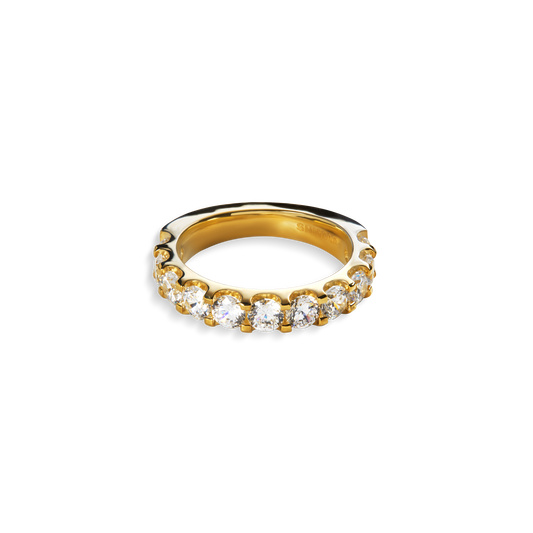 The Shinola 2 Carat Diamond Anniversary Band YG showcases a row of round natural diamonds set in 14k yellow gold, elegantly displayed against a plain white background.