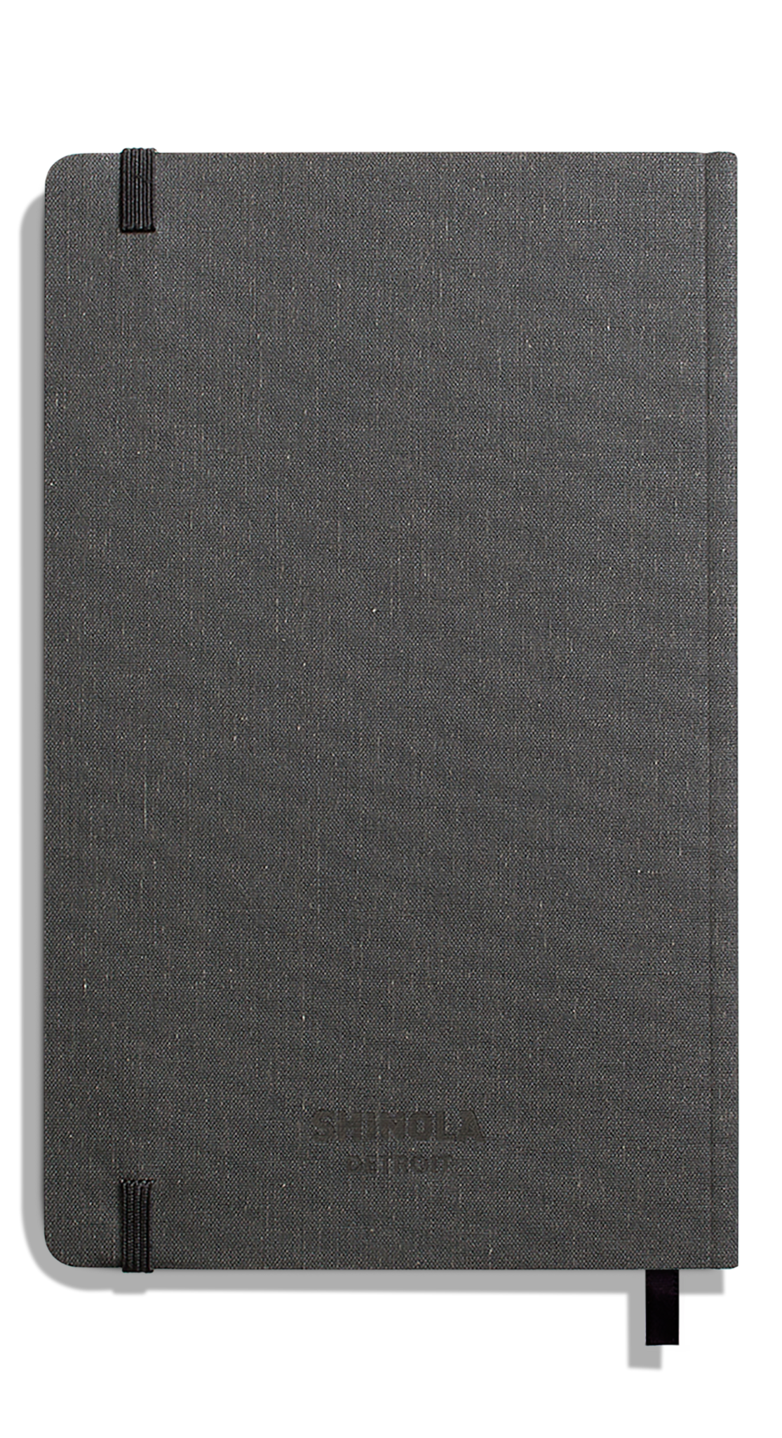 The Shinola Medium Soft Ruled Journal in Charcoal features a smyth-sewn binding, fabric-textured dark gray hardcover, rounded corners, black elastic band, and ribbon bookmark, displayed against a white background.