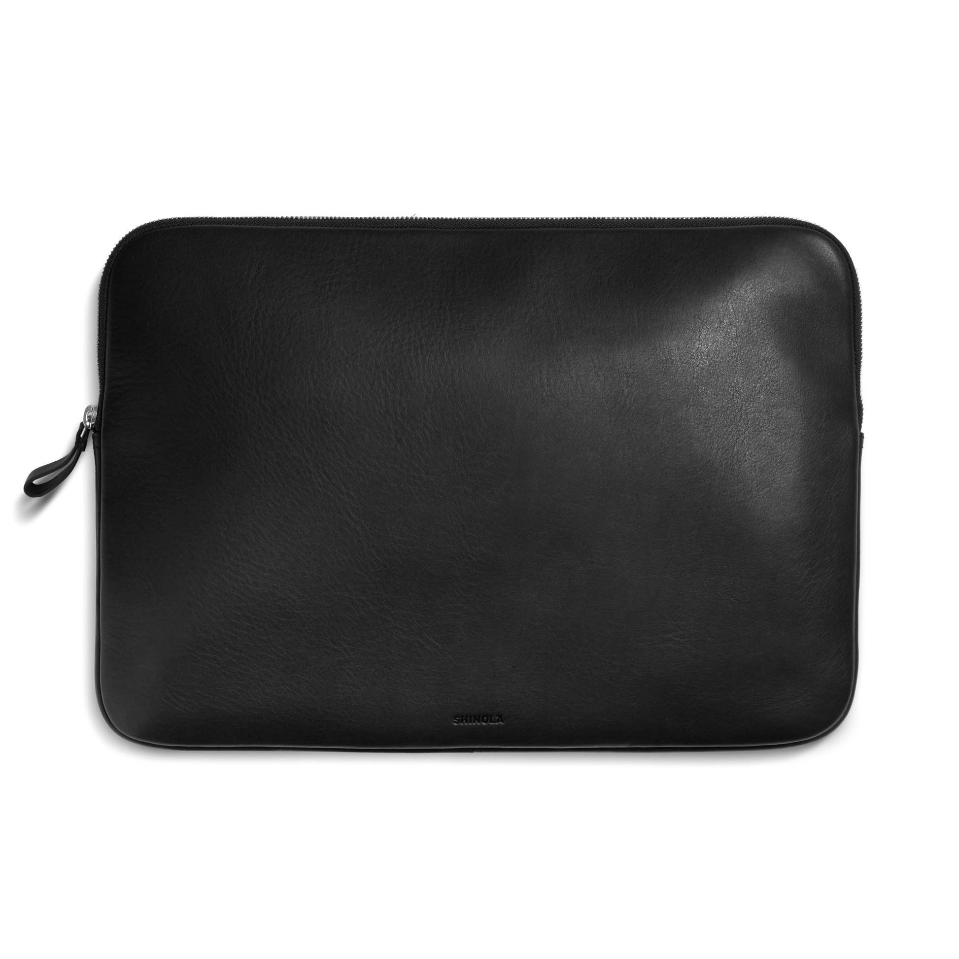 The Shinola Laptop Tech Case - Black is a sleek leather zippered sleeve that doubles as an elegant accessory organizer, shown here against a plain white background.
