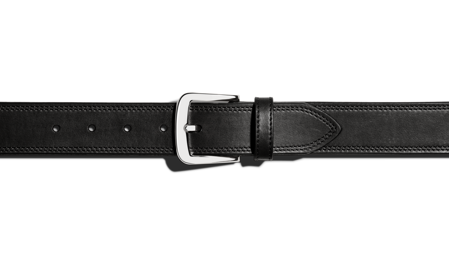 The Shinola 1 1/2" Double Stitch Belt - Black features premium leather, black stitching detail, a silver rectangular buckle, and multiple adjustment holes, displayed on a plain white background.