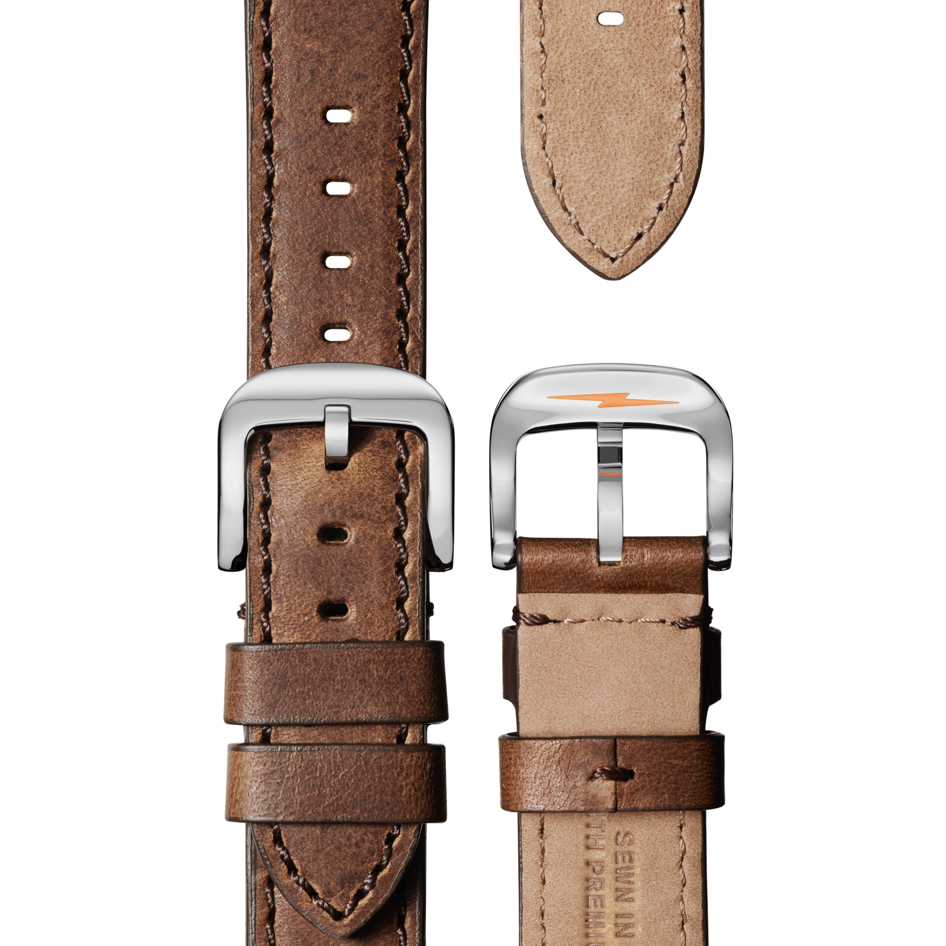 Close-up of two Shinola Runwell Watch - Ivory brown leather straps with silver buckles, displaying front and back sides. The leather features visible stitching, natural texture, and an engraved logo on the inside.