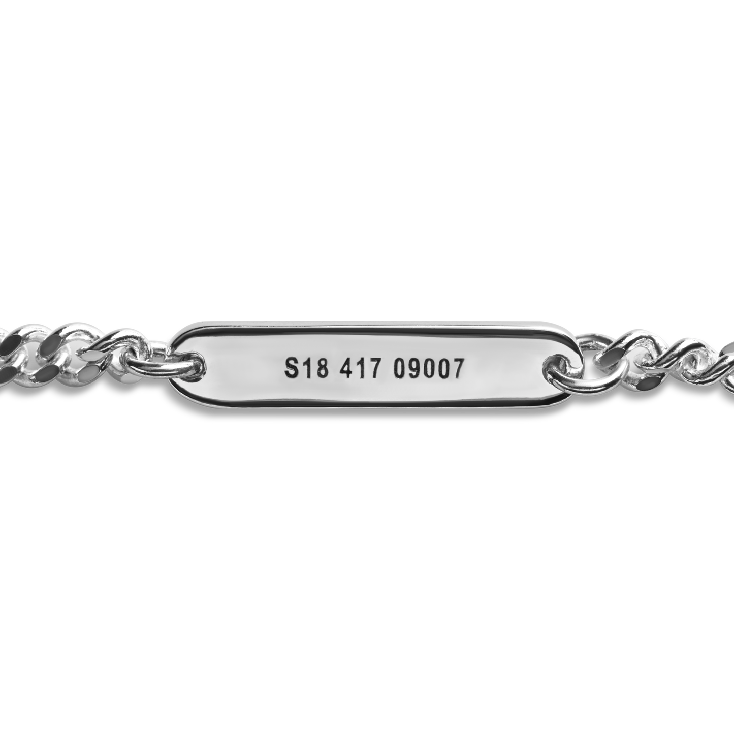 A close-up of a Shinola 3mm Gauge Chain Bracelet in sterling silver with a rectangular ID plate engraved S18 417 09007, shown on a white background.