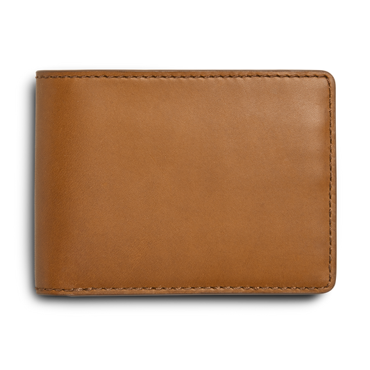 A closed Shinola Slim Bifold Wallet - Tan with visible edge stitching and RFID protection, shown against a plain white background.