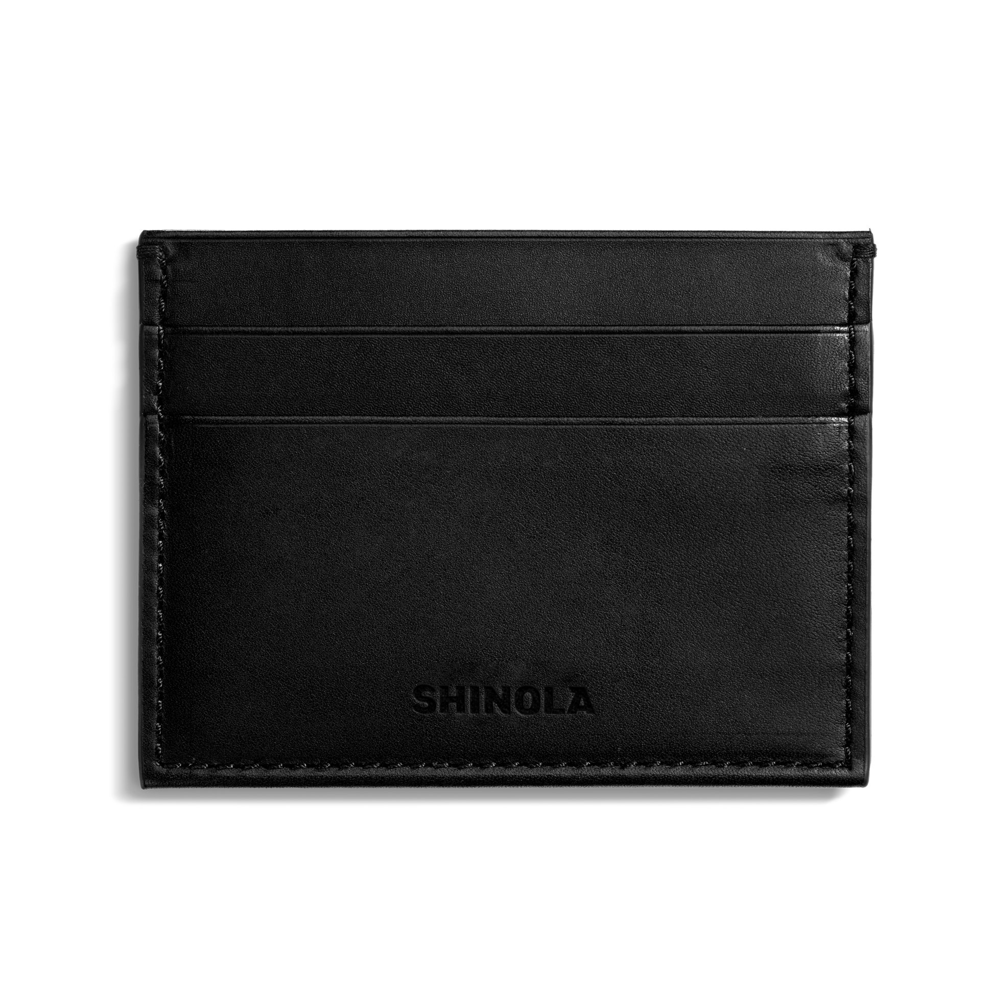 The Shinola 5 Pocket Card Holder in black vachetta leather features two horizontal card slots on one side and an embossed Shinola logo at the bottom center, shown against a plain white background.