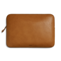 The Laptop Tech Case - Tan by Shinola is a rectangular tan leather sleeve with a top zipper and the Shinola logo near the bottom center, shown against a plain white background.