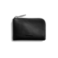 The Zip Key Wallet - Black by Shinola features black vegetable tanned leather, a silver zipper, and Shinola embossed on the front, displayed against a plain white background.