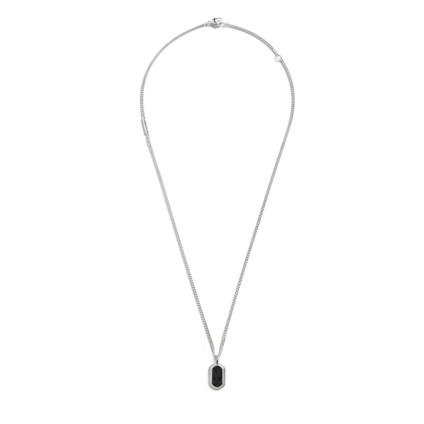 The Shinola Black Diamond Pave Tag Necklace features a small rectangular black pendant on an adjustable sterling silver curb chain, displayed against a white background for an elegant and versatile look.