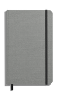 The Shinola Medium Hard Ruled Journal - Stone, a closed gray fabric-covered linen journal with acid-free paper, features a black elastic band and ribbon bookmark, shown on a white background.
