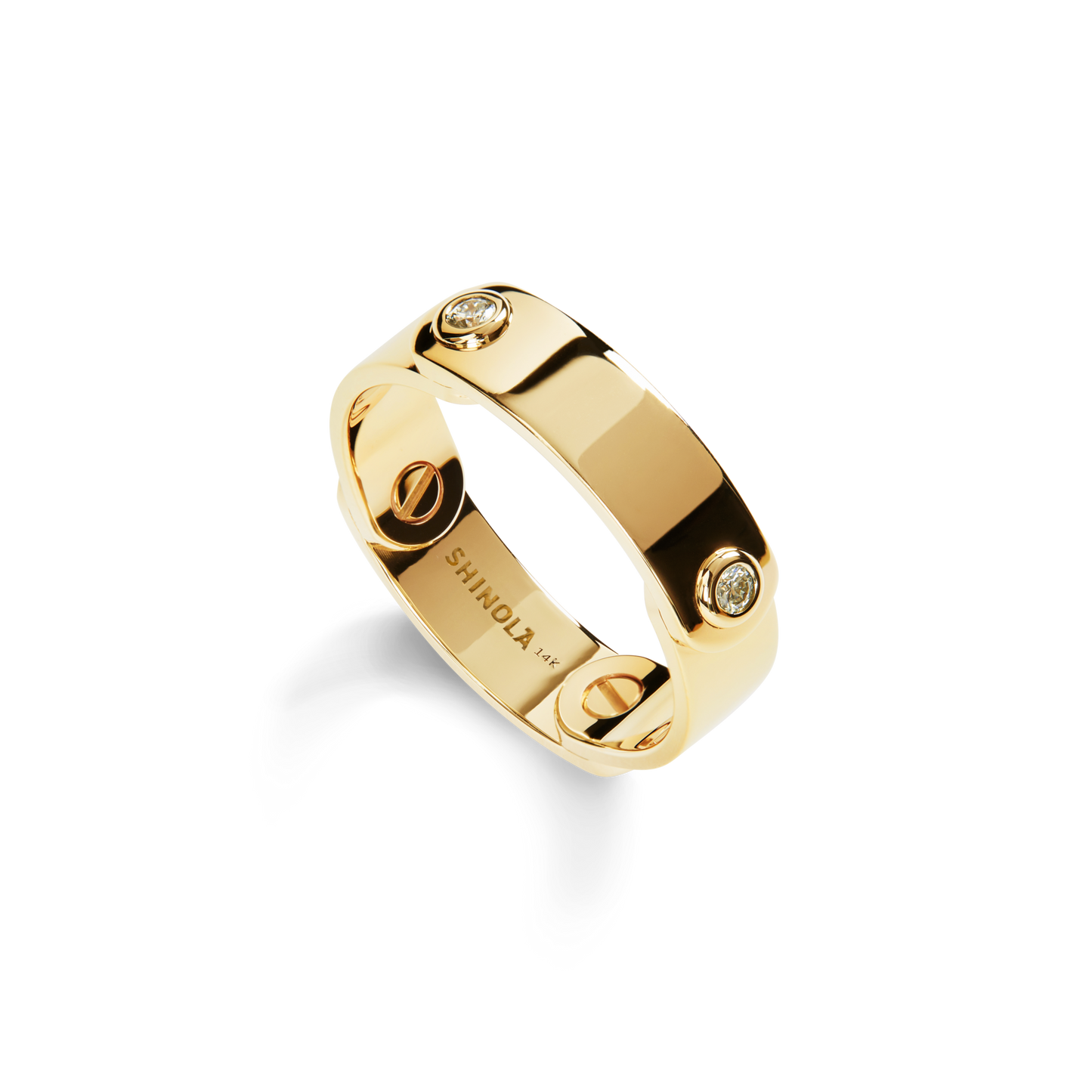The Shinola Diamond Rivet Plaque Ring in 14K yellow gold features three small embedded diamonds and the word SHINOLA engraved inside. It is shown against a plain white background.