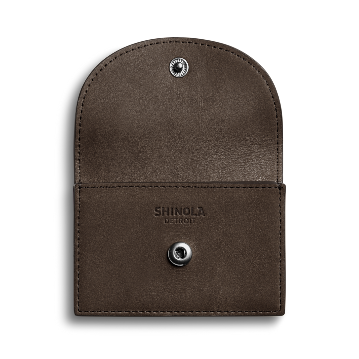 An open Birdy Accordion Card Case Espresso by Shinola, featuring card pockets, a snap button closure, and "Shinola Detroit" embossed on the inside flap, is displayed against a plain white background.