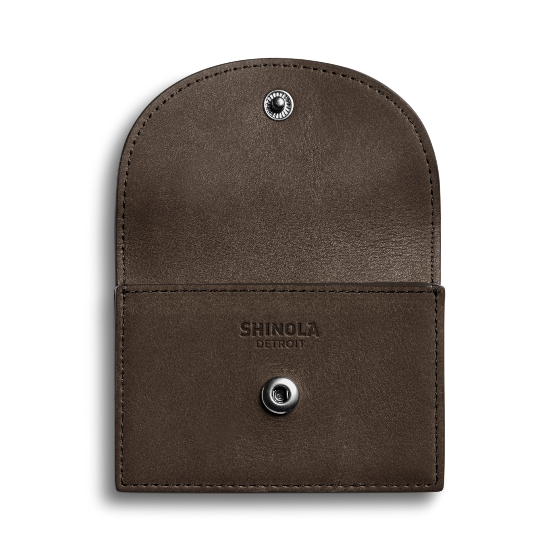 An open Birdy Accordion Card Case Espresso by Shinola, featuring card pockets, a snap button closure, and "Shinola Detroit" embossed on the inside flap, is displayed against a plain white background.