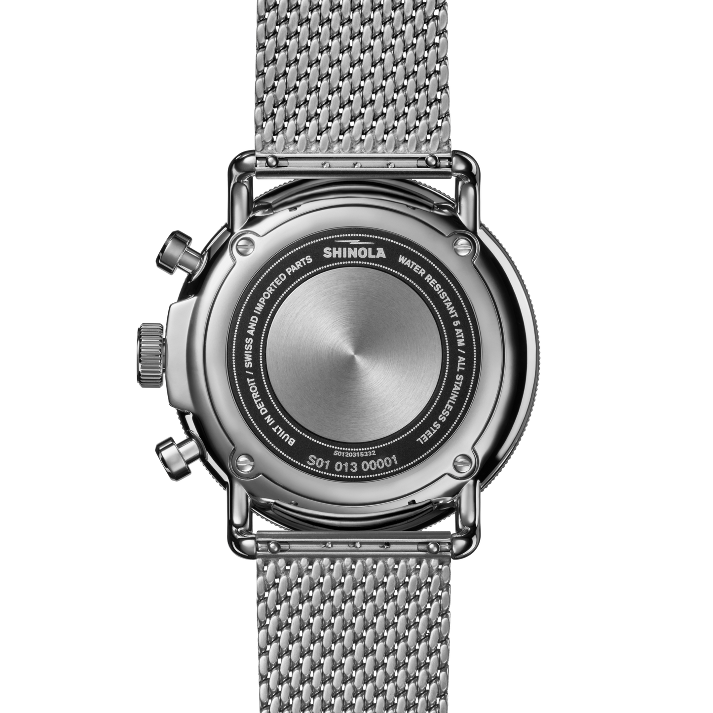 Back view of the Shinola Canfield C56 Chronograph Watch - Whiskey, featuring a stainless steel mesh bracelet and round case with engraved details on water resistance, materials, and serial number.