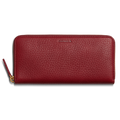 The Continental Zip Wallet - Ruby by Shinola is crafted from natural grain leather with a textured finish, card pockets, and a gold zipper pull. SHINOLA is embossed near the top center.