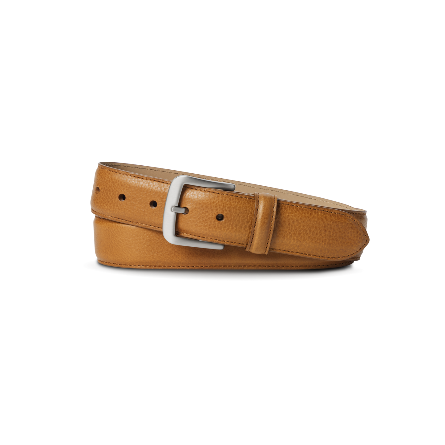 The Shinola 1 1/2" Canfield Belt in Bourbon is crafted from Italian Vachetta leather, showcasing a tan finish and silver rectangular buckle, neatly rolled and set against a plain white background.