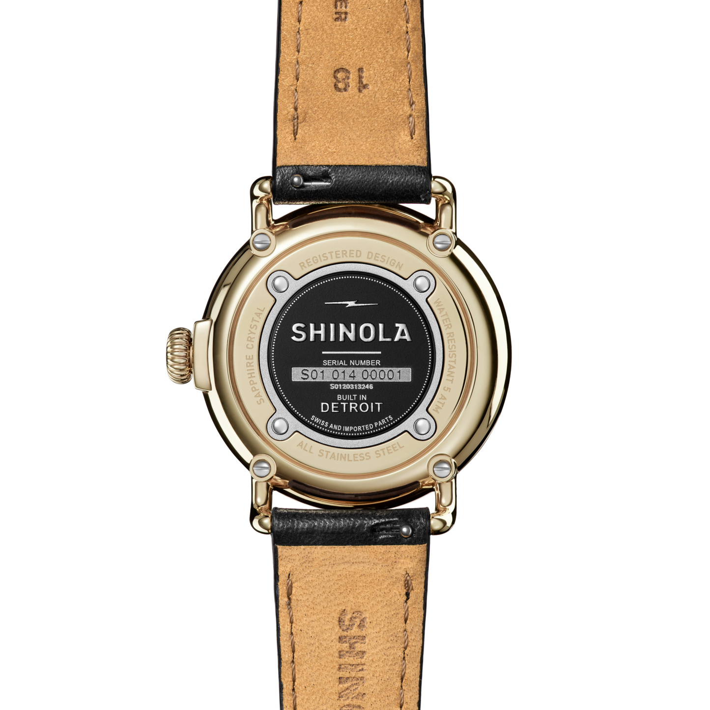 The back of a Shinola Runwell Watch - MOP Black Leather Strap features a gold stainless steel case, black leather strap, visible serial number S01.014.00001, and engraving that reads BUILT IN DETROIT and ALL STAINLESS STEEL.